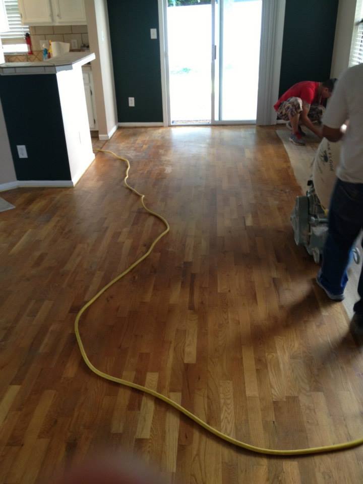A hardwood floor before being refinished